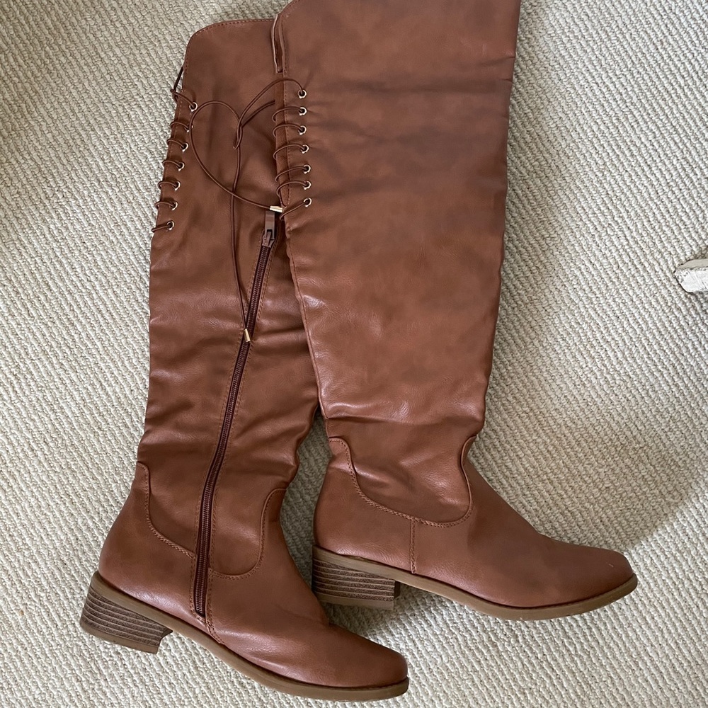 Over the knee tie boots